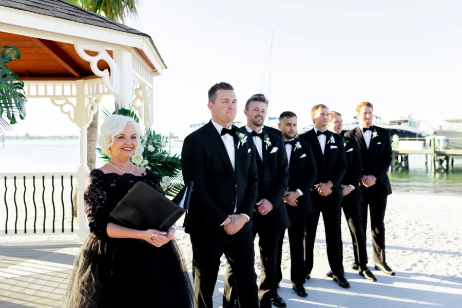 Groom and Groomsmen Wearing Black Suits with Bowties Wedding Attire Ideas