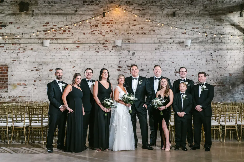 Black Tie Wedding Inspiration | Mismatched Black Bridesmaids Dresses and Groomsmen Tuxedos | Blended Family Wedding Portrait Ideas