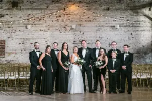 Black Tie Wedding Inspiration | Mismatched Black Bridesmaids Dresses and Groomsmen Tuxedos | Blended Family Wedding Portrait Ideas
