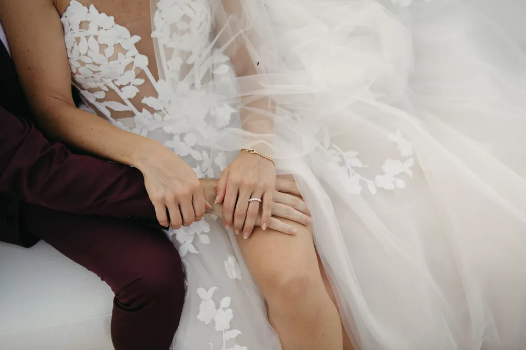 Diamond Wedding Band Ideas | Groom's Maroon Suit Inspiration | Elegant White Strapless Sheer Boned Bodice Ballgown Wedding Dress with Floral Appliques