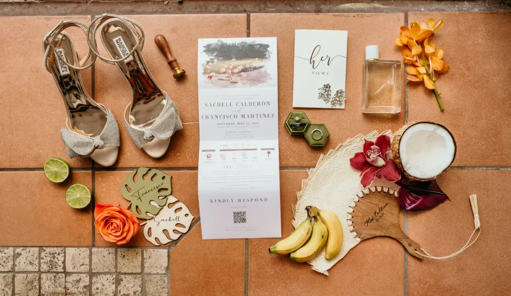 Tropical All-in-one Seal and Send Wedding Invitation Flat Lay Ideas | Badgley Mischka Bow Wedding Shoe Inspiration