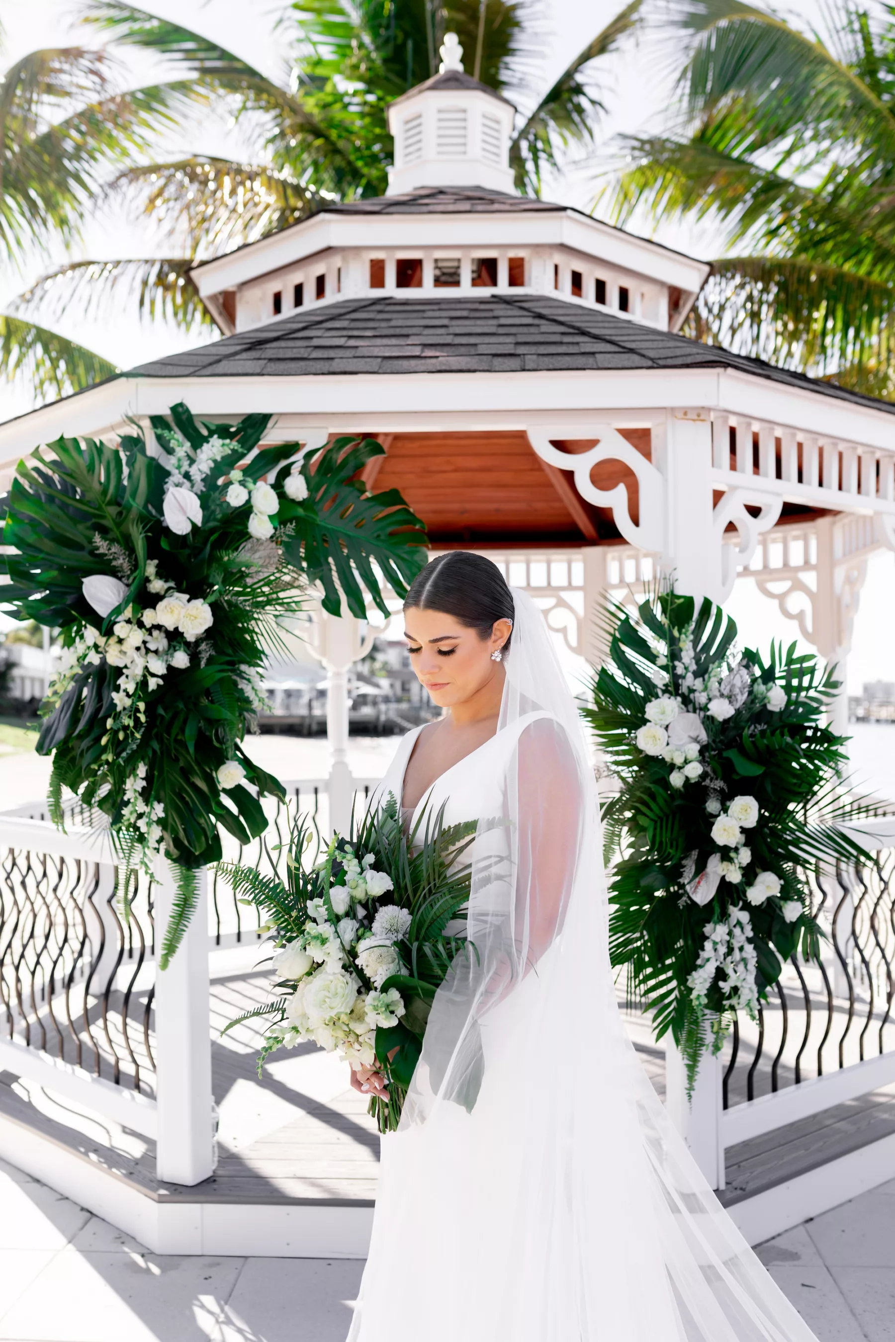 Tropical Wedding Ceremony Inspiration | Elegant Updo Hair and Makeup Ideas | Tampa Bay Hair and Makeup Artist Femme Akoi Beauty Studio | Venue Isla Del Sol Yacht & Country Club