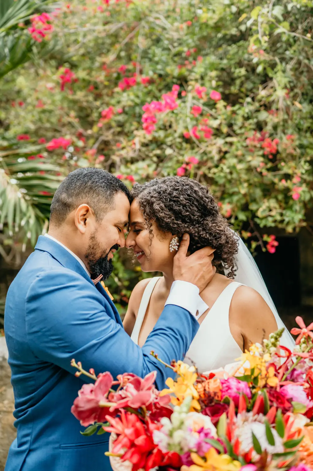 Bride and Groom Just Married Wedding Portrait | Tropical Bridal Bouquet with Red King Protea, Orange Pincushion Protea, Pink Roses, Orchids, and Palm Leaves | St Pete Florist Save The Date Florida