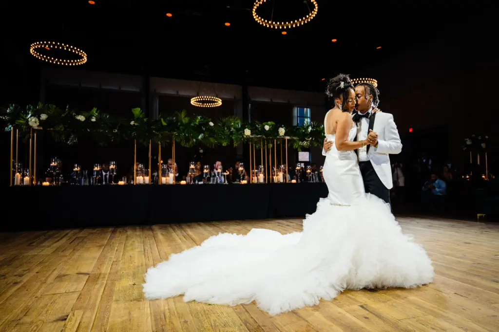 Bride and Groom First Dance Wedding Portrait | Tampa Bay Videographer Priceless Studio Design | Downtown Tampa Heights Event Venue Armature Works