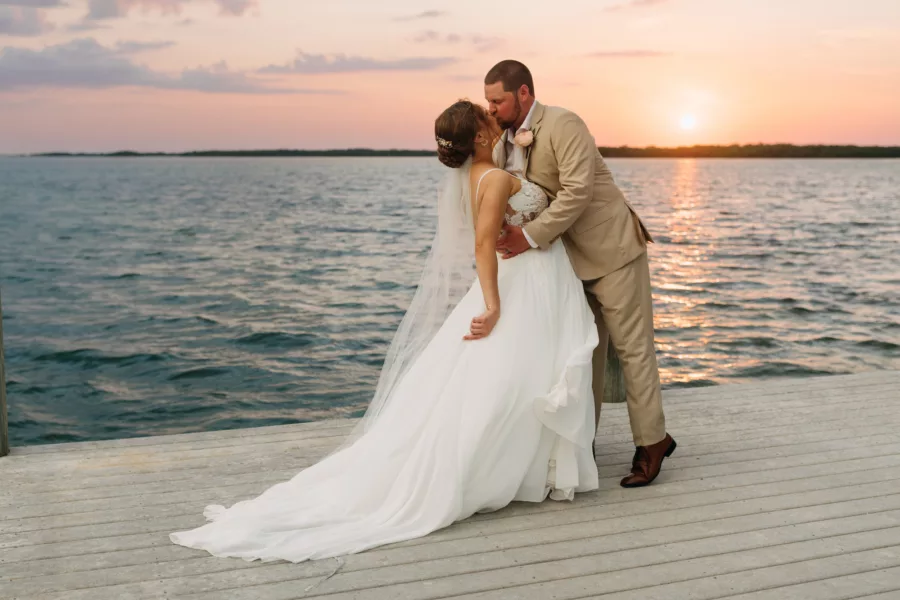 Bride and Groom Romantic Sunset Dock Wedding Portrait | Venue Venue Tampa Bay Watch | Photographer Amber McWhorter Photography