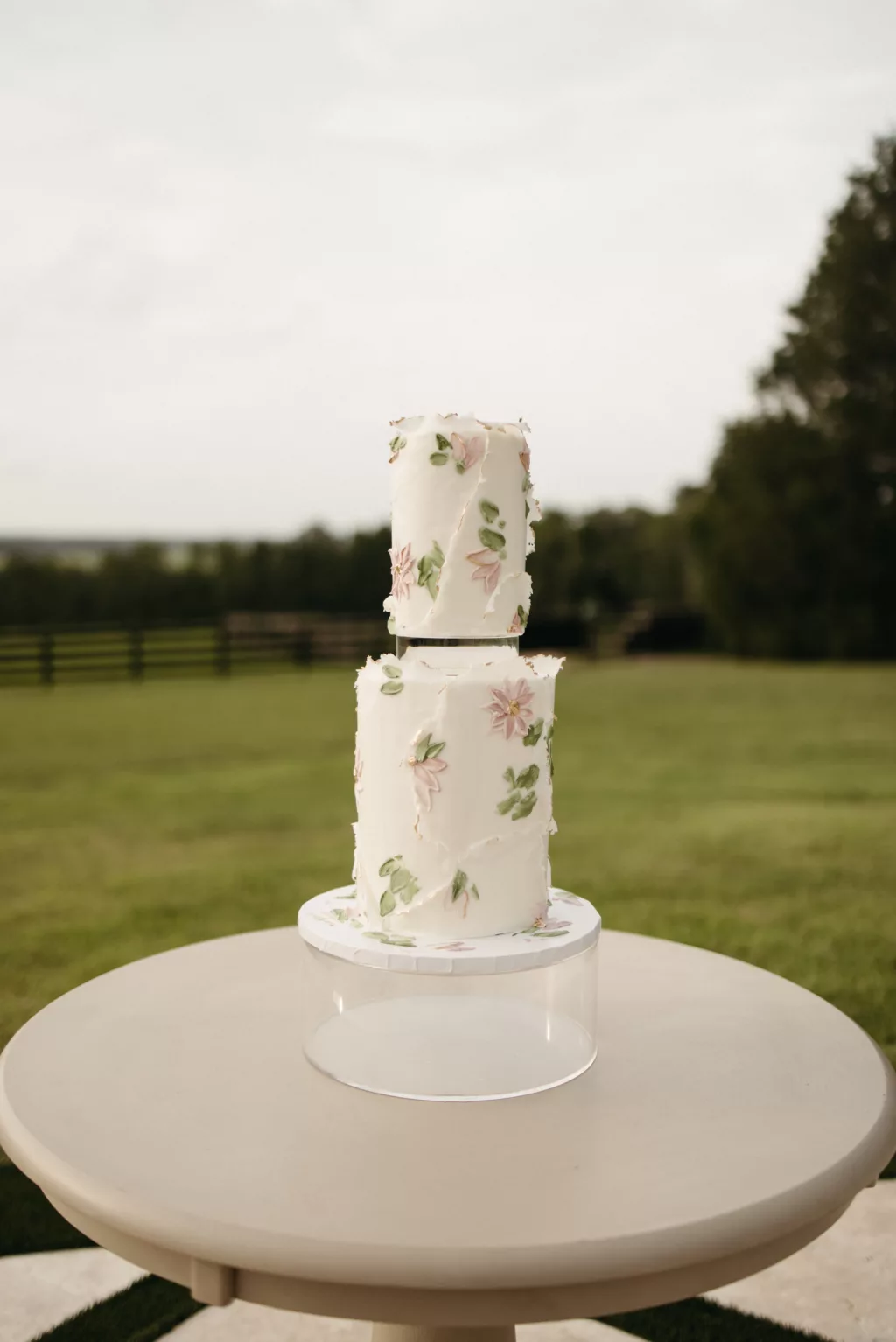 Bride and Groom Cutting the Cake Wedding Portrait | Round Two-Tiered Cake with Floating Tier and Floral Detail Inspiration