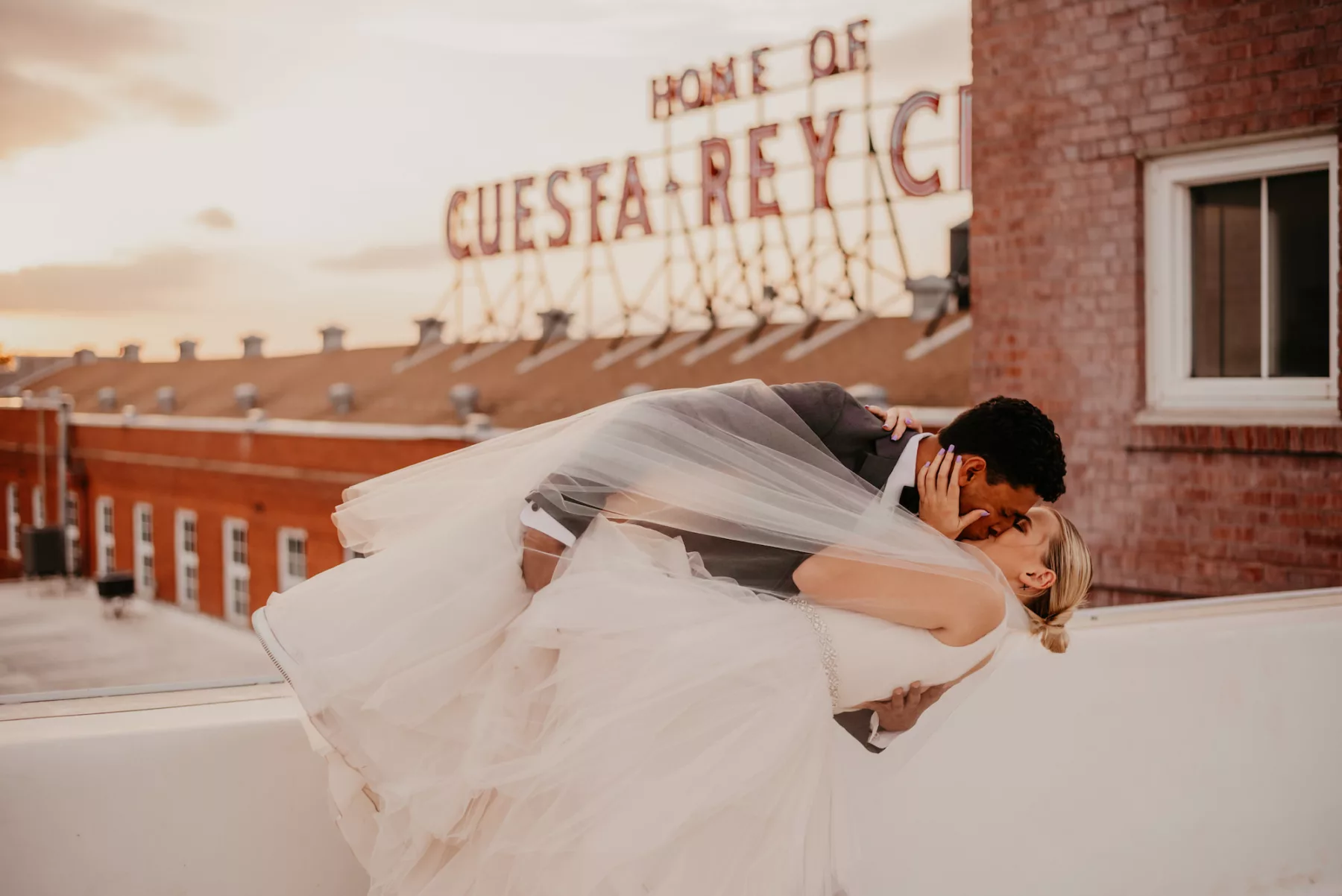 Intimate Bride and Groom Ybor Rooftop Wedding Portrait | Tampa Bay Planner B Eventful | Historic Ybor Cigar Factory Industrial Wedding Venue Inspiration J.C. Newman