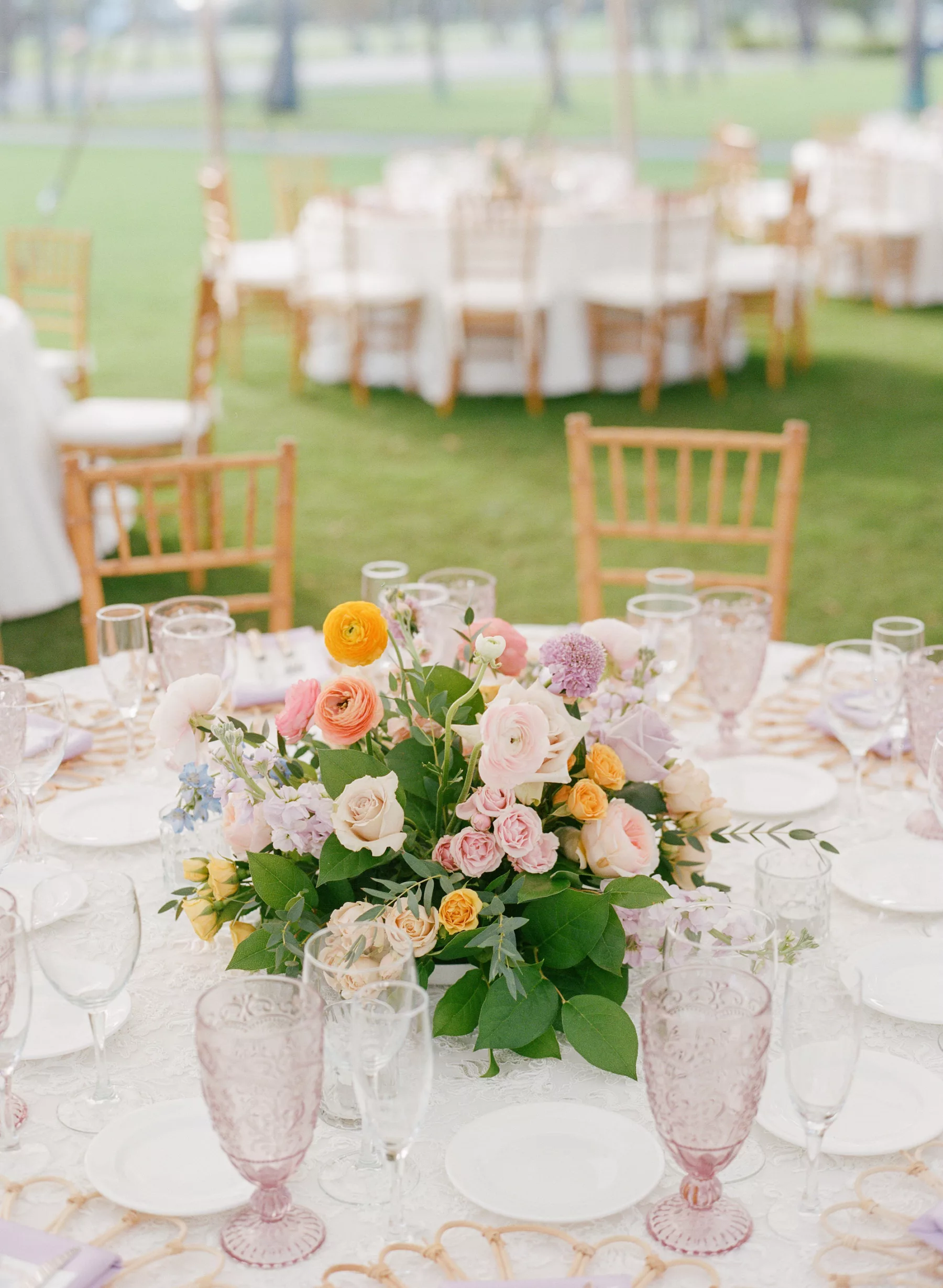 Pastel Yellow and Pink Ranunculus, White Roses, and Greenery Centerpiece Decor Inspiration for Luxurious Old Florida Wedding Reception