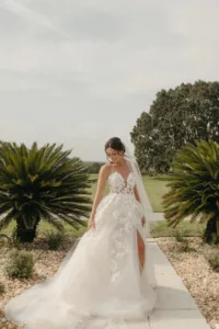 Elegant White Strapless Sheer Boned Bodice Ballgown Wedding Dress with Floral Applique Inspiration | Bridal Updo Hair and Makeup Ideas | Tampa Bay Artist Femme Akoi Beauty Studio