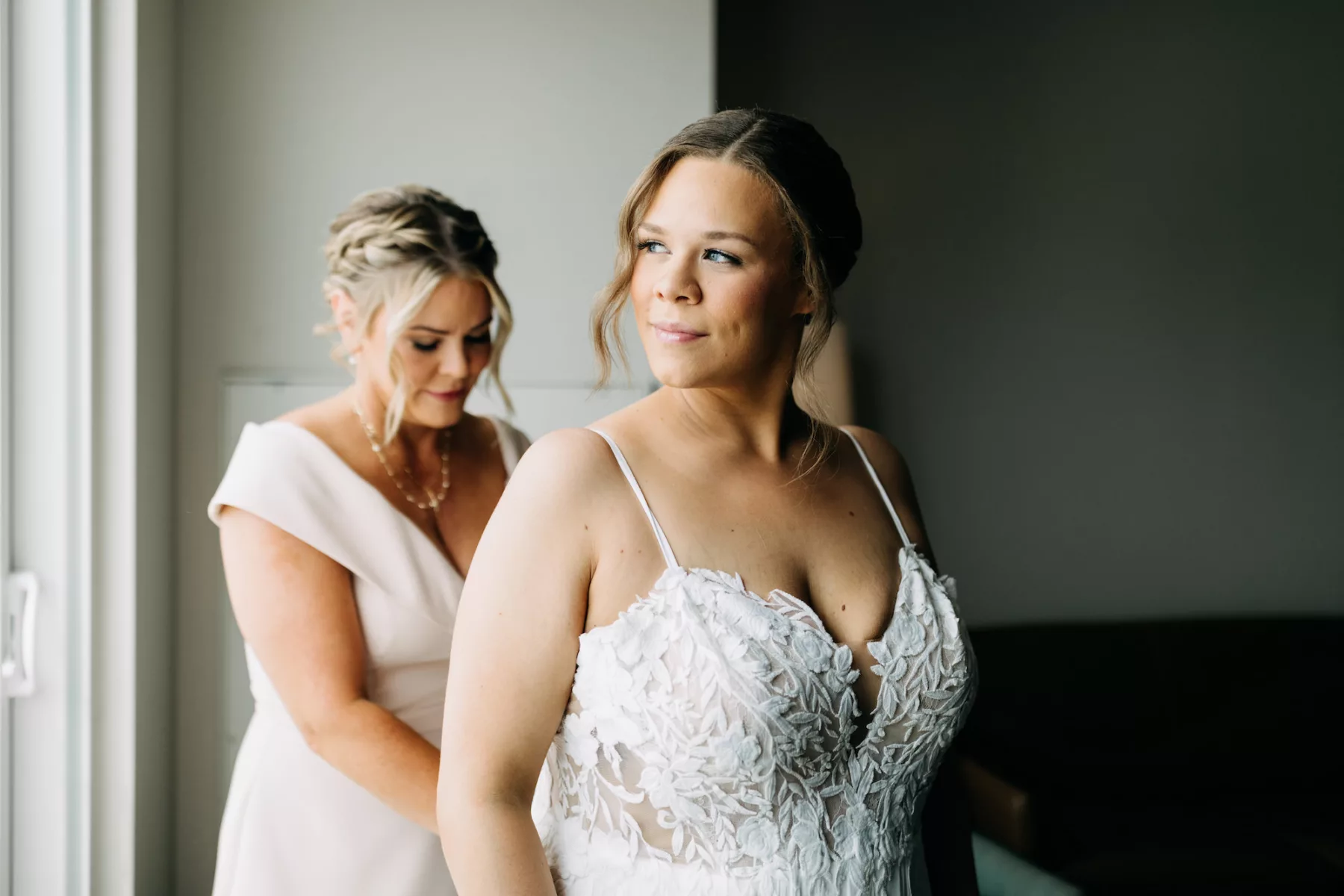 Bride Getting Ready | Ivory Spaghetti Strap Lace A Line Wedding Dress Ideas | Elegant Wedding Hair Updo and Makeup Inspiration | Tampa Bay Hair and Makeup Artist Adore Bridal