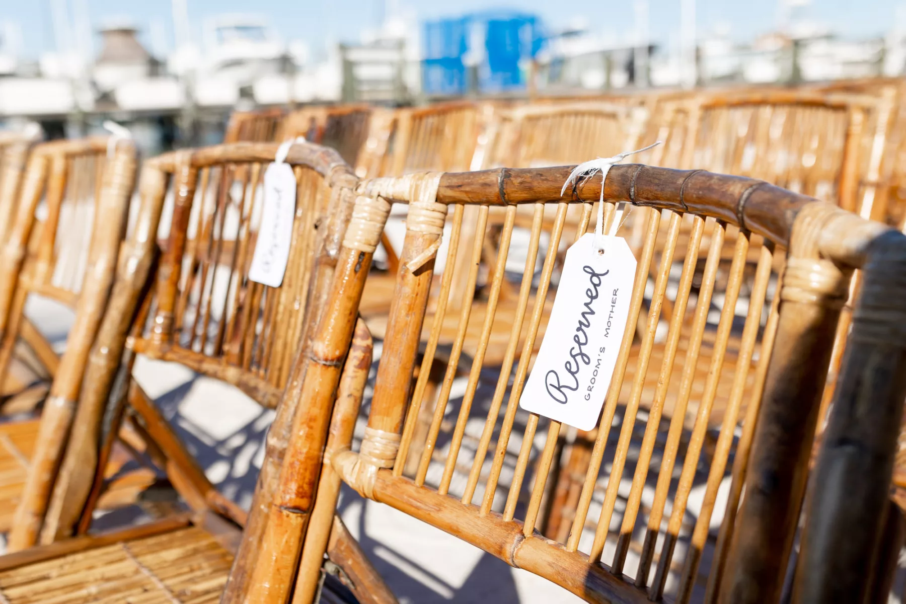 Tropical Wedding Ceremony with Bamboo Chairs and Reserved Seat Tag Ideas