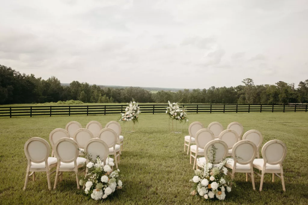 Elegant Outdoor European Inspired Wedding Ceremony Decor Ideas | White Round King Louis Chair Inspiration | Intimate Wedding Elopement | Tampa Bay Event Venue La Hacienda on Snow Hill