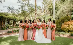 Mismatching Beige Taupe and Burnt Orange Bridesmaids Dresses with Tropical Wedding Bouquets | Tampa Bay Florist Save The Date Florida | St. Petersburg Planner Eventfull Weddings