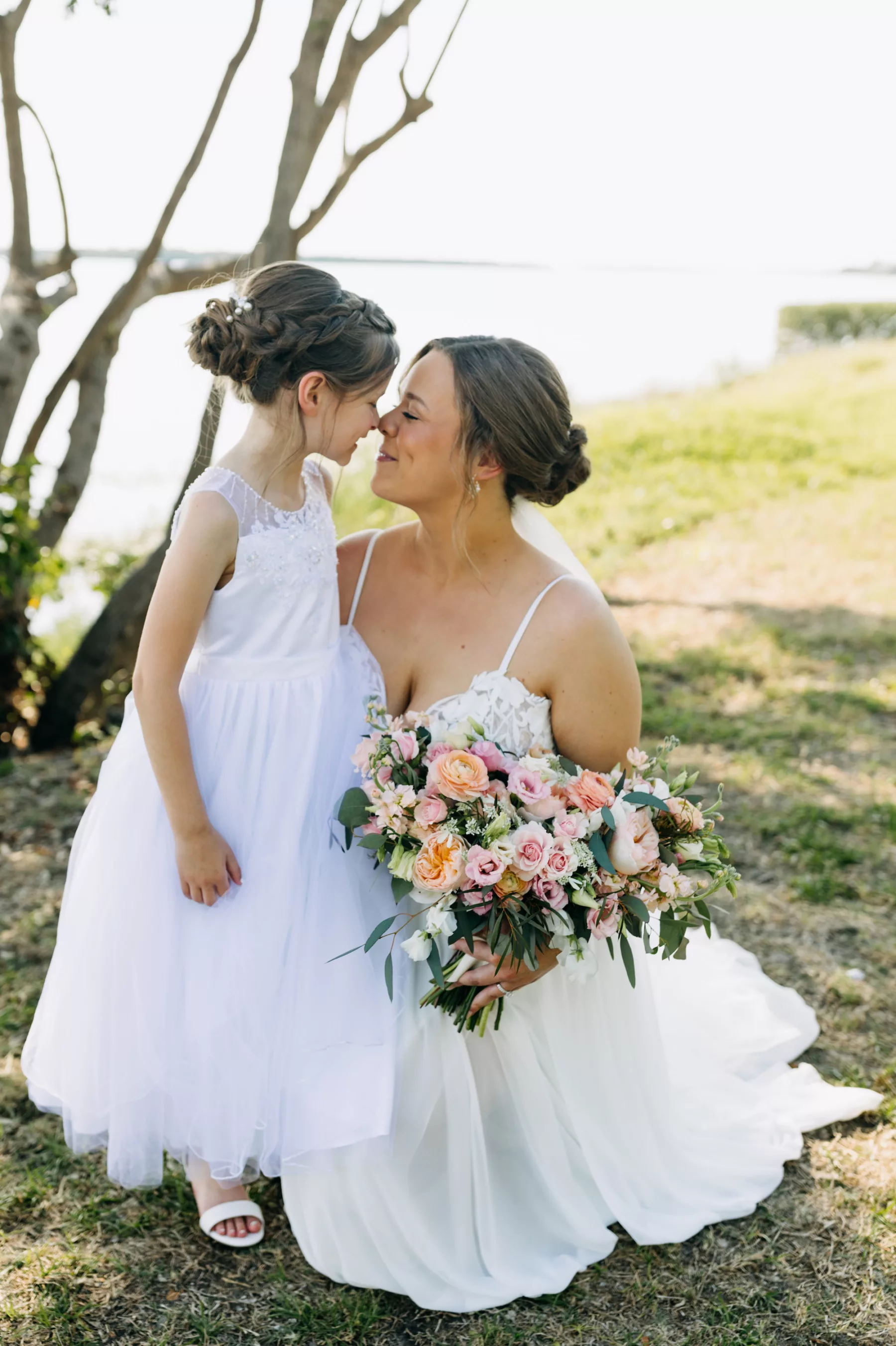 Bride with Daughter on Wedding Day Portrait | Pink and Orange Summer Rose Bouquet Ideas | Tampa Bay Hair and Makeup Adore Bridal | Florist Beneva Flowers