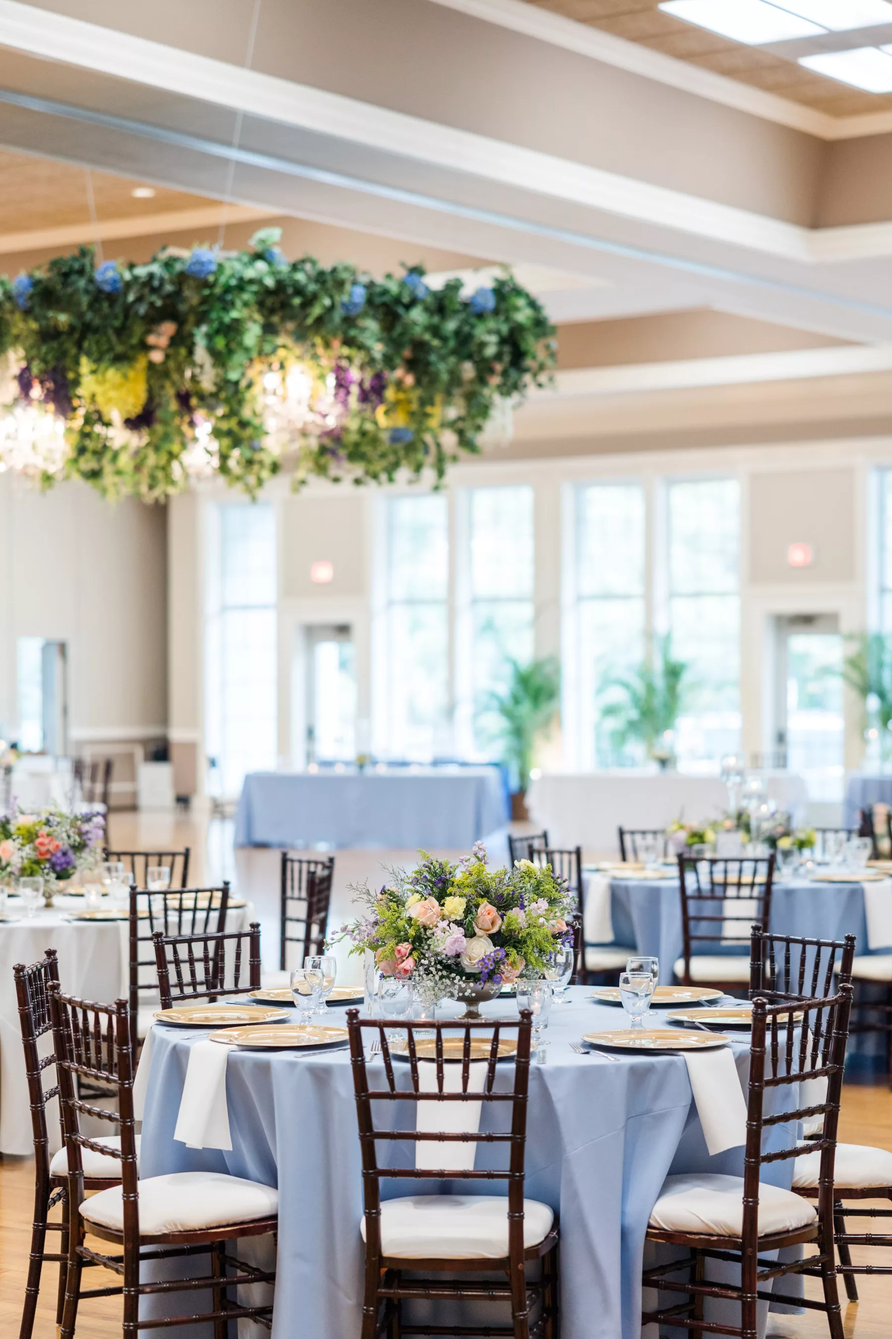 Blue and Peach Spring English Garden Inspired Ballroom Wedding Reception with Mahogany Chiavari Chairs Ideas and Floral Chandelier
