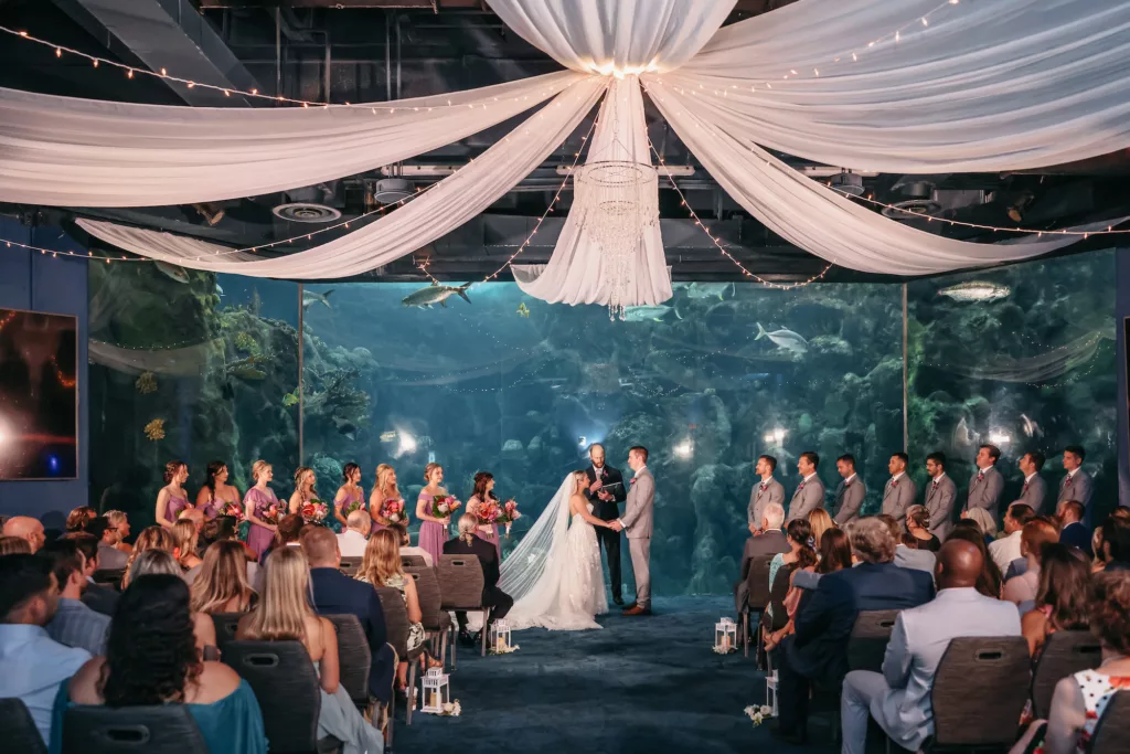 Bride and Groom Vow Exchange in the Coral Reef Gallery Ideas | White Wedding Ceremony Decor Inspiration | Tampa Bay Event Venue The Florida Aquarium| Photographer Lifelong Photography Studio