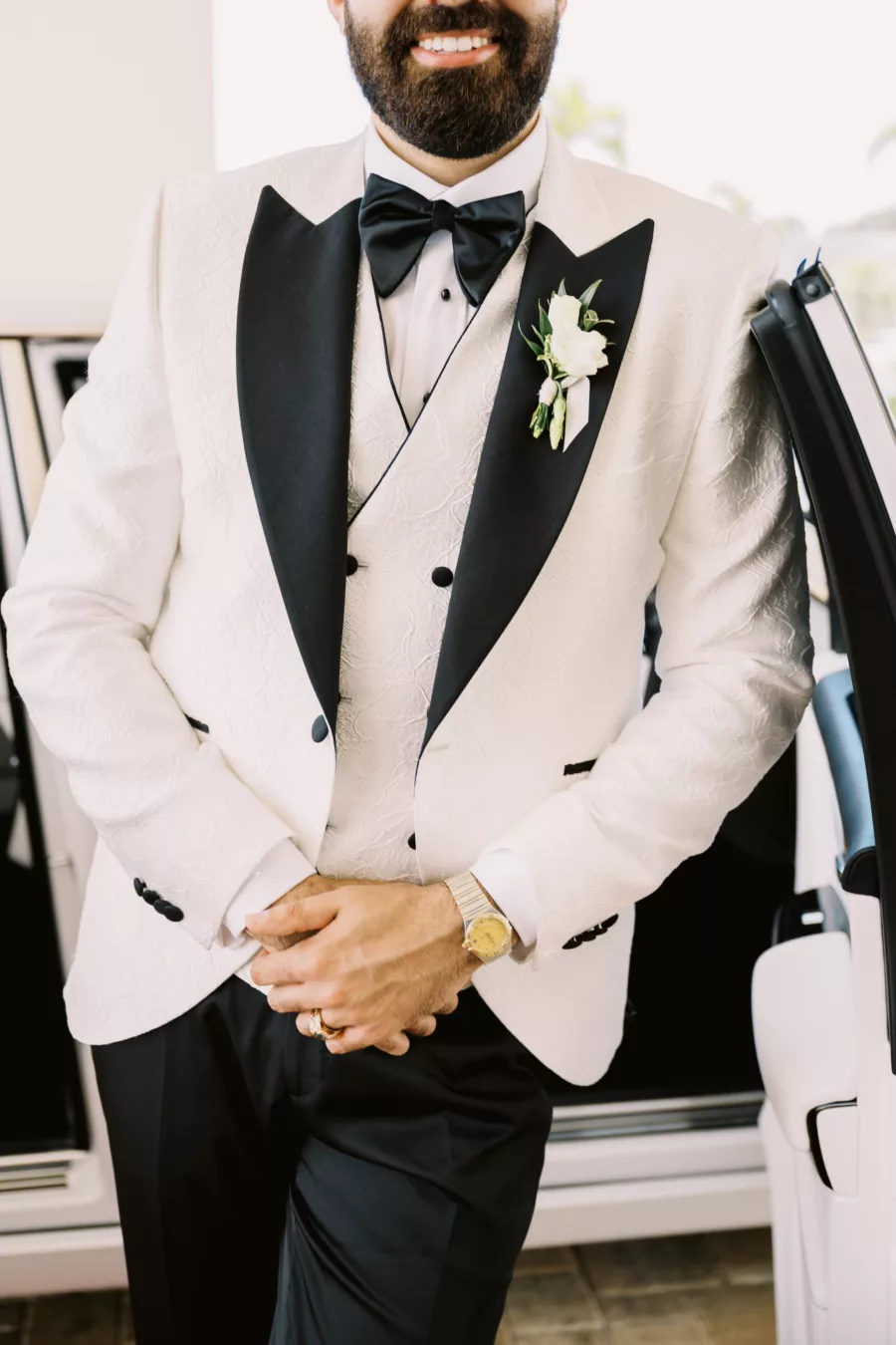 Groom's Wedding Day Attired Ideas | Black and White Three Piece Tuxedo