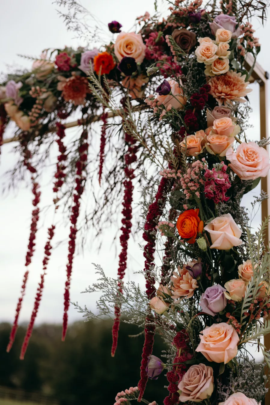 Whimsical Purple and Peach Roses, Chrysanthemums, Amaranthus, and Greenery Wedding Ceremony Arbor Decor Inspiration | Tampa Florist Save The Date Florida