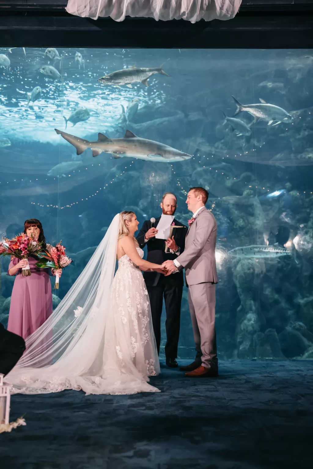 Bride and Groom Wedding Ceremony Vow Exchange in the Coral Reef Gallery Ideas | Tampa Bay Event Venue The Florida Aquarium | Boutique Truly Forever Bridal Tampa