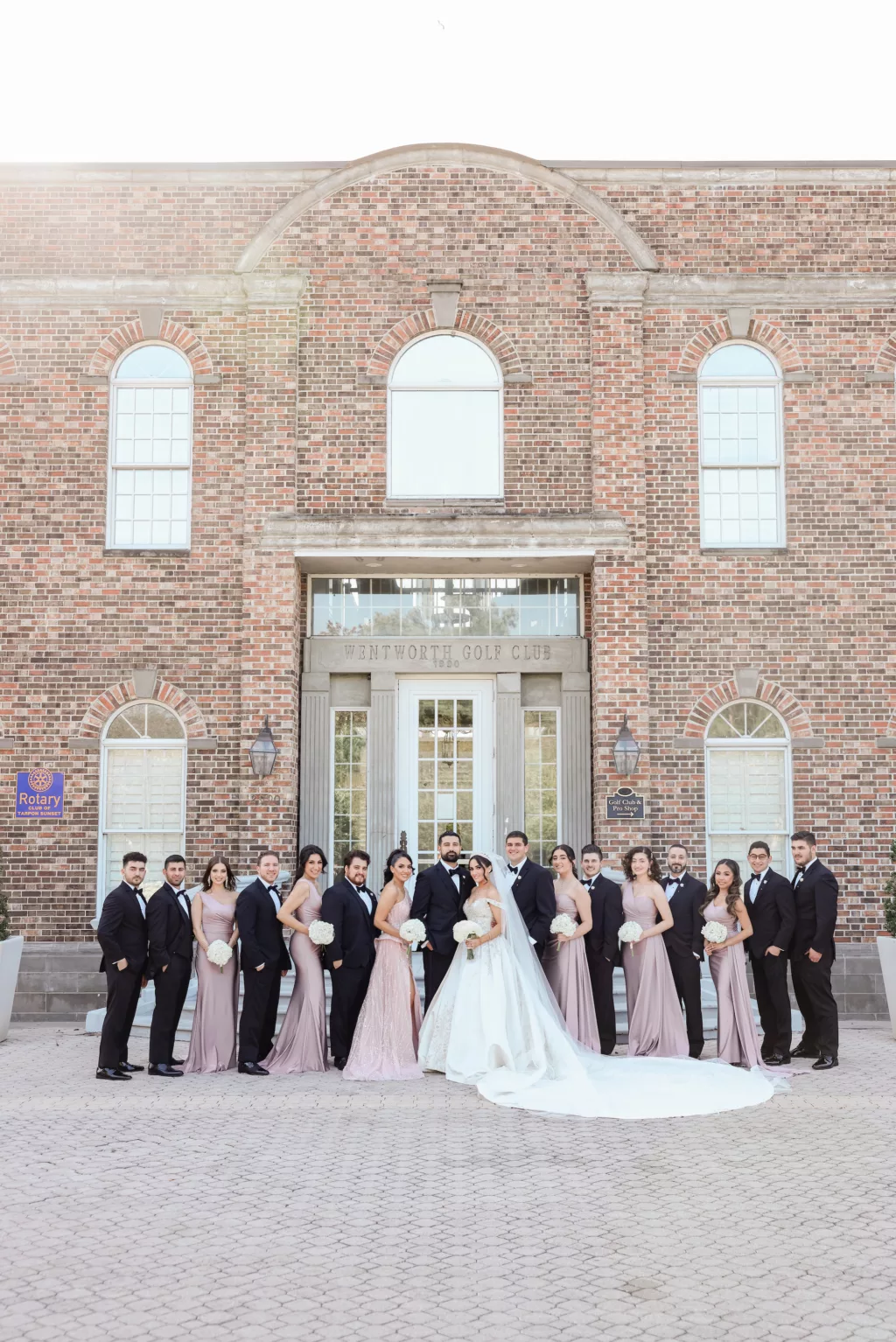 Matching Mauve Floor Length Bridesmaids Dresses Inspiration | Groomsmen Black Tuxedo Wedding Attire Ideas