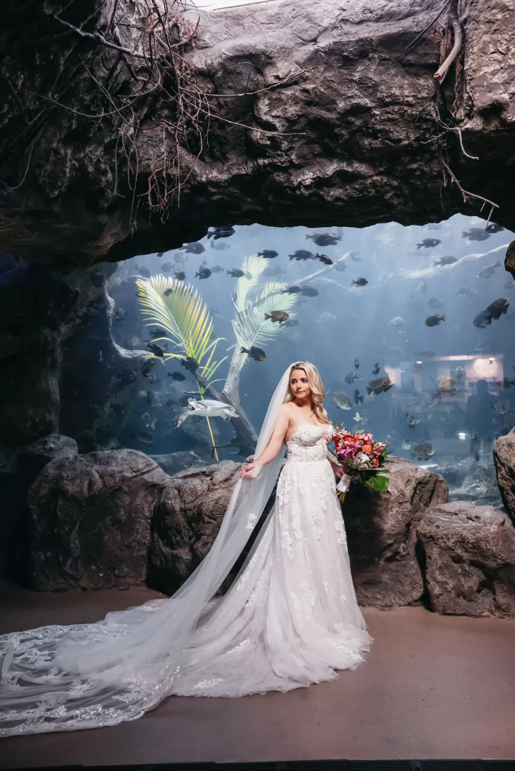White Lace A-Line Wedding Dress Ideas | Tropical Wedding Ceremony in the Coral Reef Gallery | Elegant Hair and Makeup Inspiration | Tampa Bay Boutique Truly Forever Bridal Tampa | Event Venue The Florida Aquarium | Hair and Makeup Femme Akoi Beauty Studio | Photographer Lifelong Photography Studio