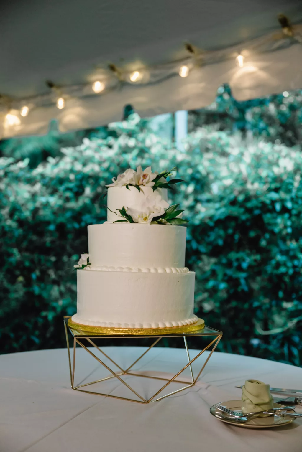Classic Round Three-Tiered Buttercream Wedding Cake with White Orchid Accents | Gold Geometric Cake Stand Ideas