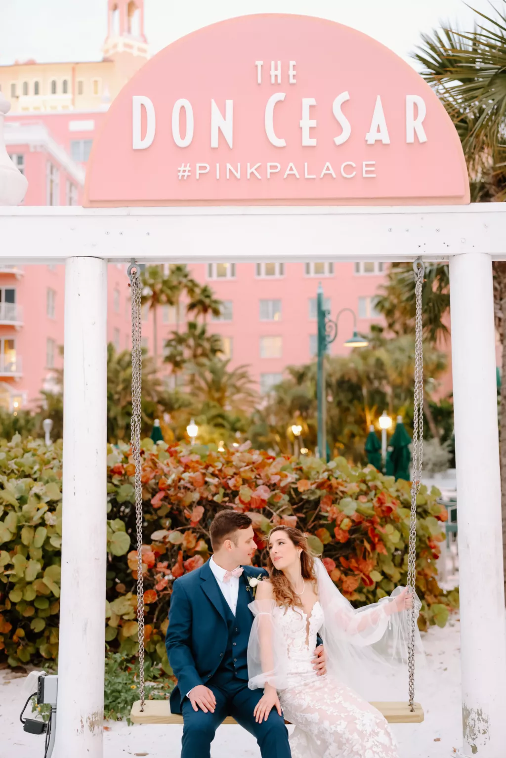 Bride and Groom on Beach Swing Wedding Portrait | Tampa Bay Photographer Lifelong Photography Studio | St. Pete Beach Hotel Venue The Don CeSar