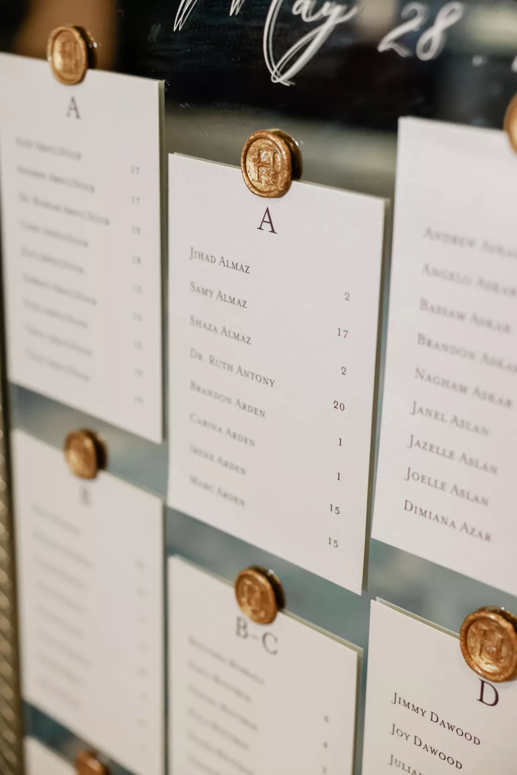 Mirror with Seal and Alphabetical Seating Chart Ideas for Modern Wedding Reception