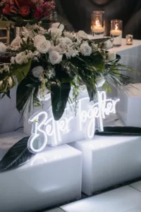 Better Together Neon Sign for Wedding Reception Sweetheart Head Table Decor Ideas with White Roses and Tropical Greenery | Tampa Bay Florist Save The Date Florida