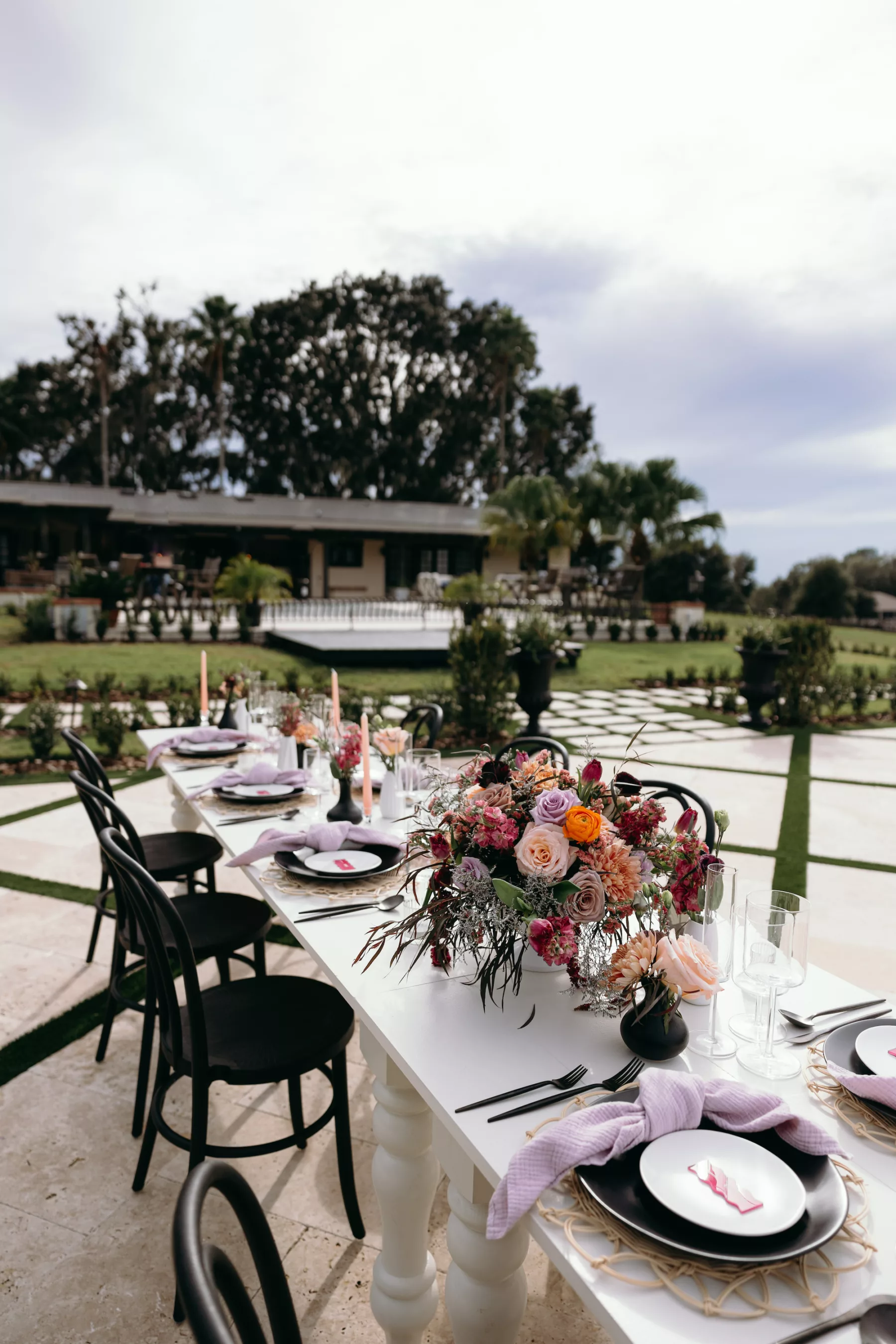 Whimsical Fall Purple and Peach Terrace Wedding Reception Feasting Table Tablescape Ideas | Tampa Bay Event Venue La Hacienda at Snow Hill | Planner MDP Events