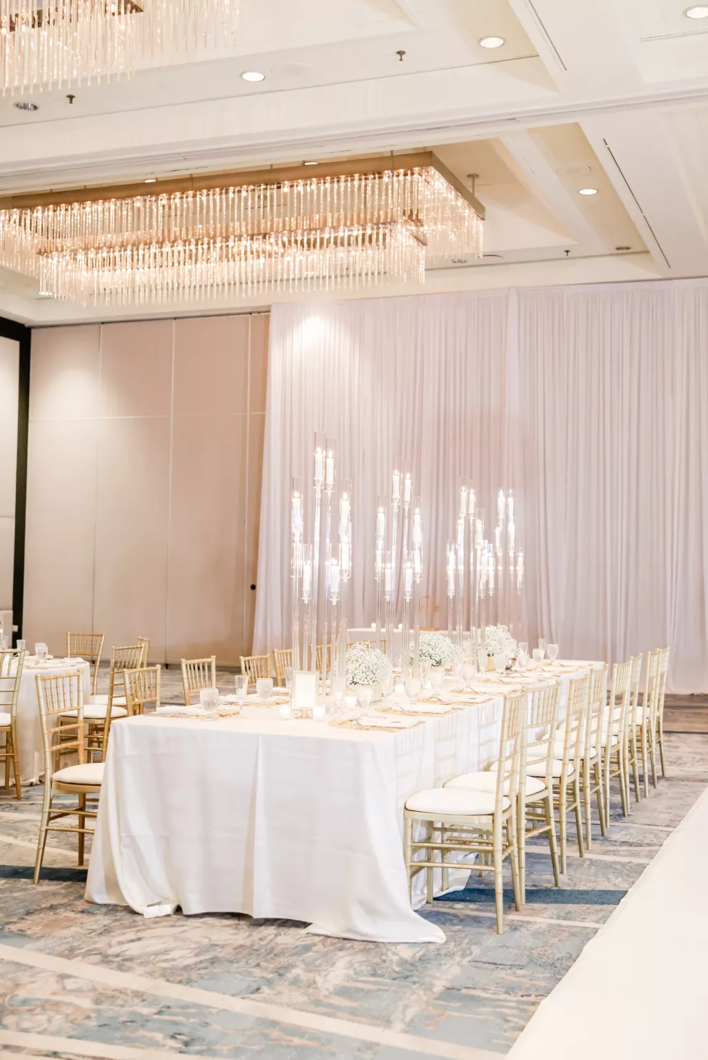 Extravagant Ivory, White, and Gold Wedding Reception Feasting Table Tablescape Decor Inspiration | Tall Modern Acrylic Candelabra Centerpiece Ideas | Gold Chiavari Chairs | Tampa Bay Hotel Venue Hilton Tampa Downtown | Planner Special Moments Event Planning