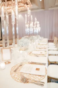 Extravagant Ivory, White, and Gold Wedding Reception Feasting Table Tablescape Decor Inspiration