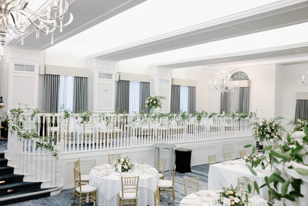 White and Gold Grand Ballroom Wedding Reception | Greenery Garland Banister Decor Inspiration | Tampa Bay Event Venue The Don Cesar