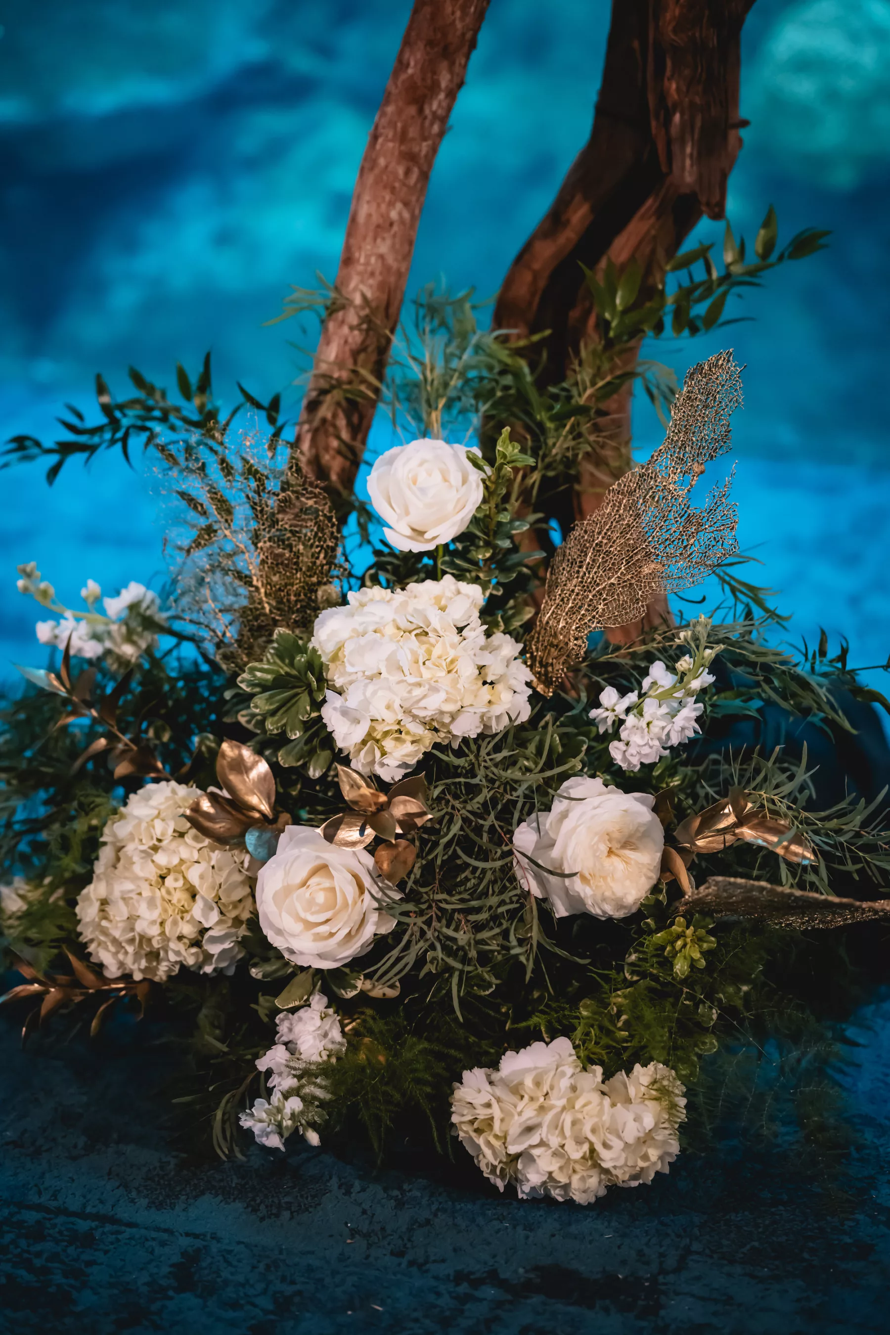 White Hydrangeas, Roses, Greenery, and Gold Coral Wedding Ceremony Driftwood Arch Floral Arrangement Ideas | Tampa Bay Florist Lemon Drops
