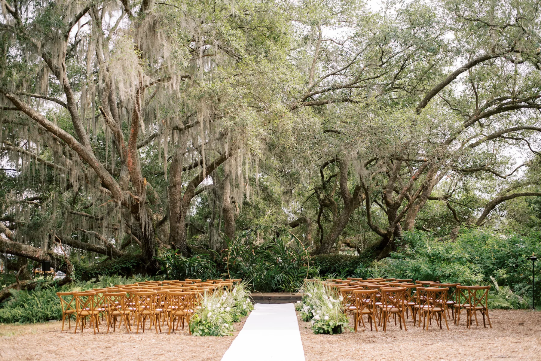 The Broken Oak Whimsical Wedding Ceremony Decor Inspiration | Wooden Crossback Chairs | Gold Hoop Arch Ideas | Tampa Bay Event Venue Mill Pond Estate