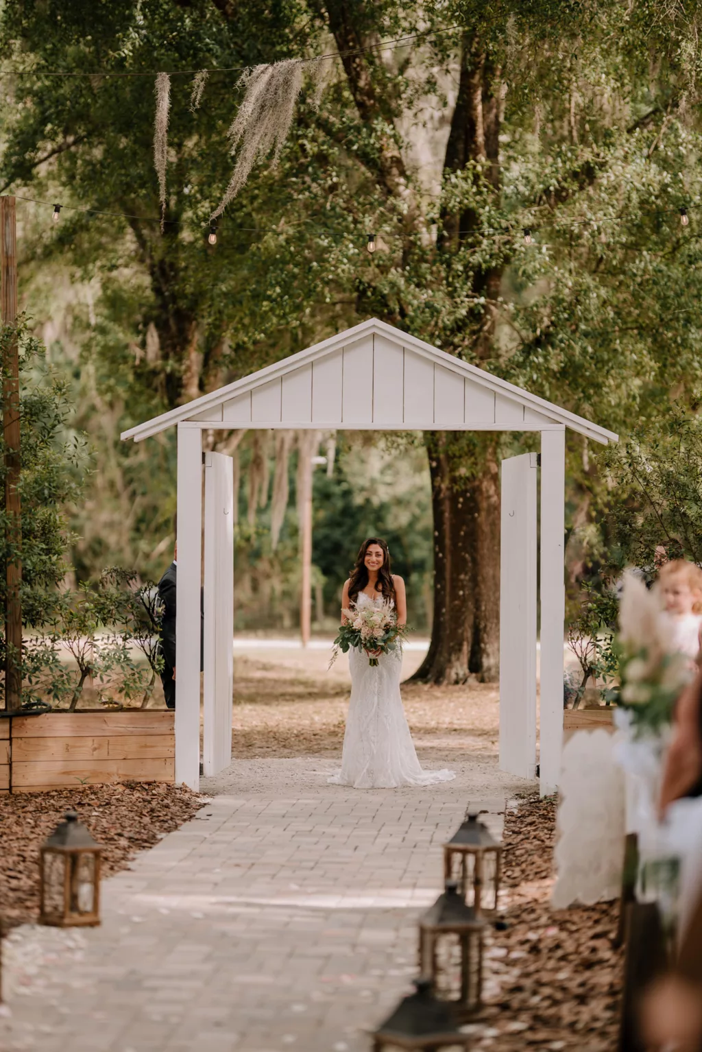 Bride Walking Down Aisle | Spring Boho Wedding Ceremony Inspiration | Florida Event Venue Ever After Farms Flower Wedding Barn