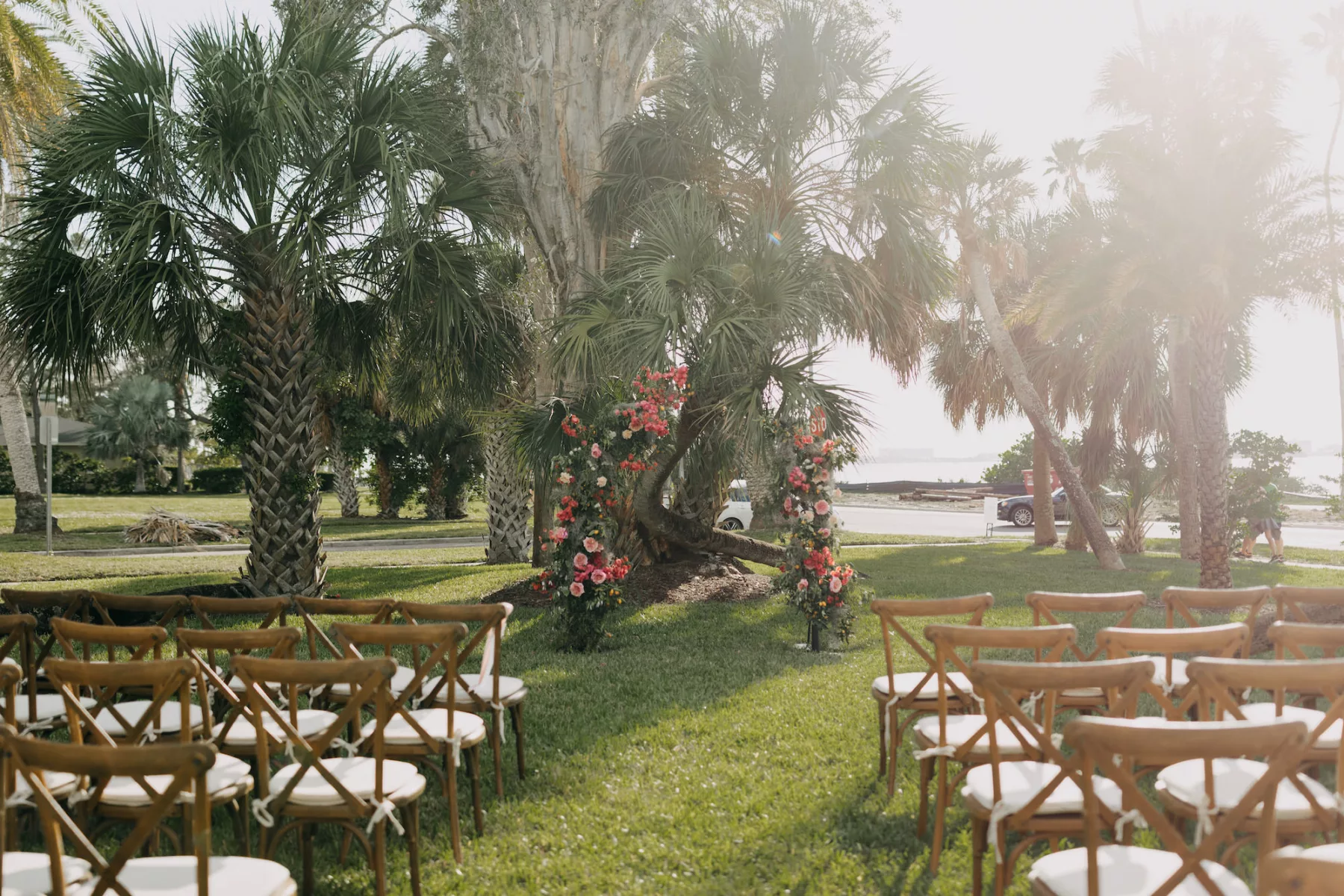Old Florida Outdoor Wedding Ceremony Decor Ideas | Wooden Crossback Chairs with Cushions Inspiration | Tampa Bay Event Planner Coastal Coordinating | Dunedin Venue The Fenway