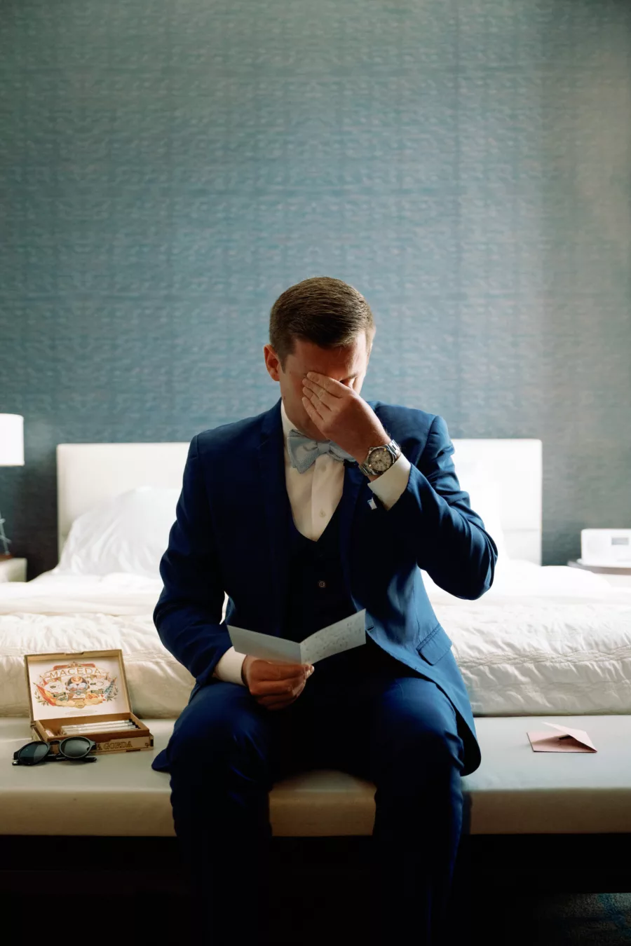 Groom Reading Letter From Bride on Wedding Day