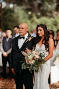 Bride and Father Walking Down Aisle Wedding Portrait