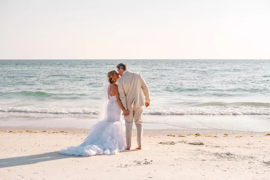 Romantic Bride and Groom Sunset Wedding Portrait | Tampa Bay Planner Gulf Beach Weddings
