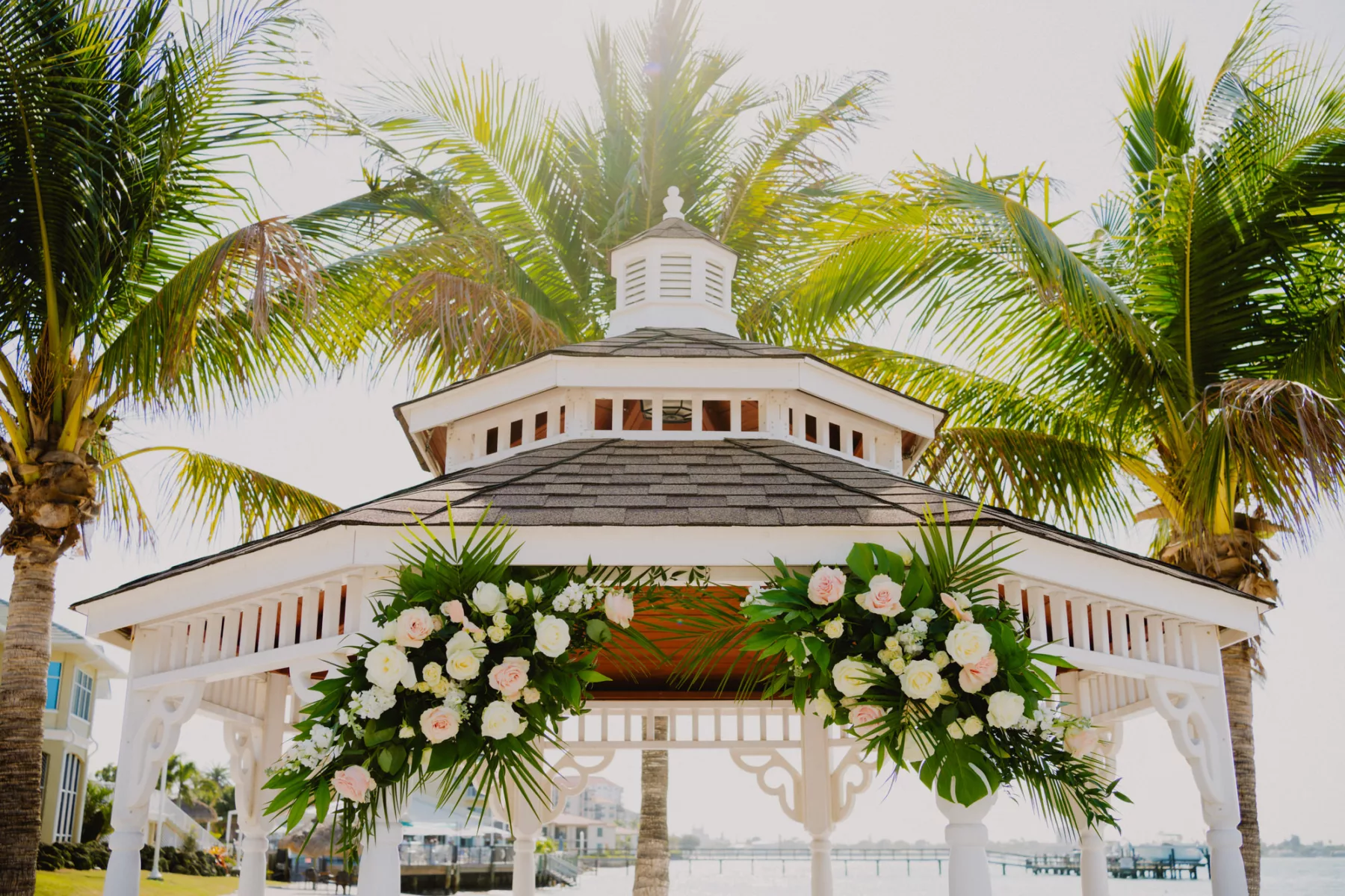 Tropical Pink and White Roses, Monstera, Palm Leaf Gazebo Spring Floral Arrangement Decor Ideas | Tampa Bay Florist Monarch Events and Design