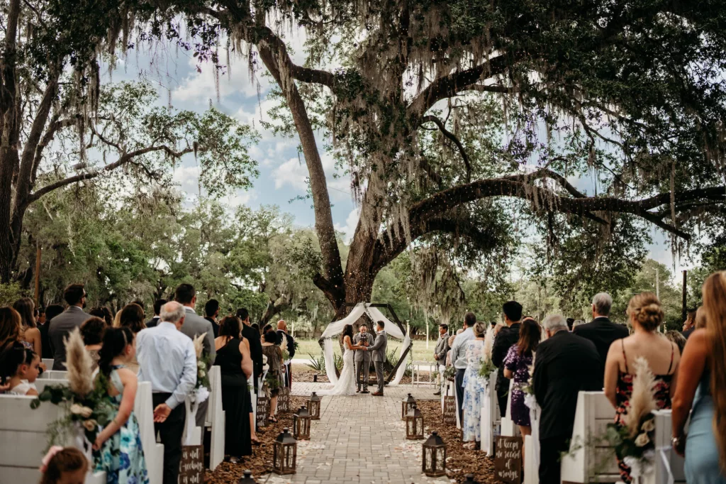 Outdoor Spring Boho Wedding Ceremony Under Large Live Oak Tree Inspiration | Florida Event Venue Ever After Farms Flower Wedding Barn | Tampa Wedding Photographer and Videographer Sabrina Autumn Photography