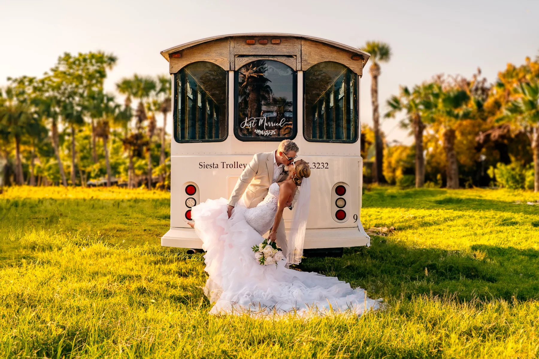 Bride and Groom Wedding Day Trolley Ride Inspiration | Bradenton Beach Transportation Ideas