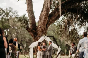 Outdoor Boho Wedding Ceremony with Hexagon Arch with White Drapery Decor Ideas | Tampa Wedding Photographer and Videographer Sabrina Autumn Photography