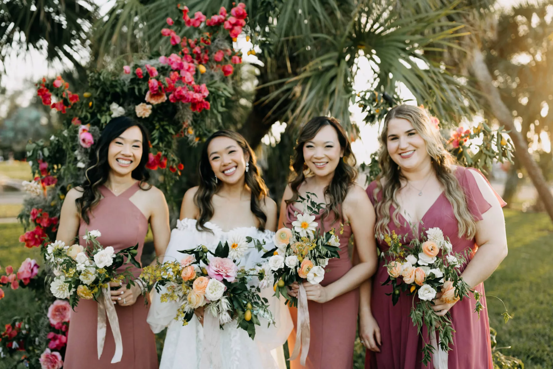 Mismatched Pink Bridesmaid Wedding Dress Ideas | Old Florida Bridal Bouquet with Pink Roses, Orange Anemones, White Chrysanthemums, and Greenery Floral Arrangement Inspiration | Tampa Bay Hair and Makeup Artist Femme Akoi Beauty Studio | Photographer Amber McWhorter Photography