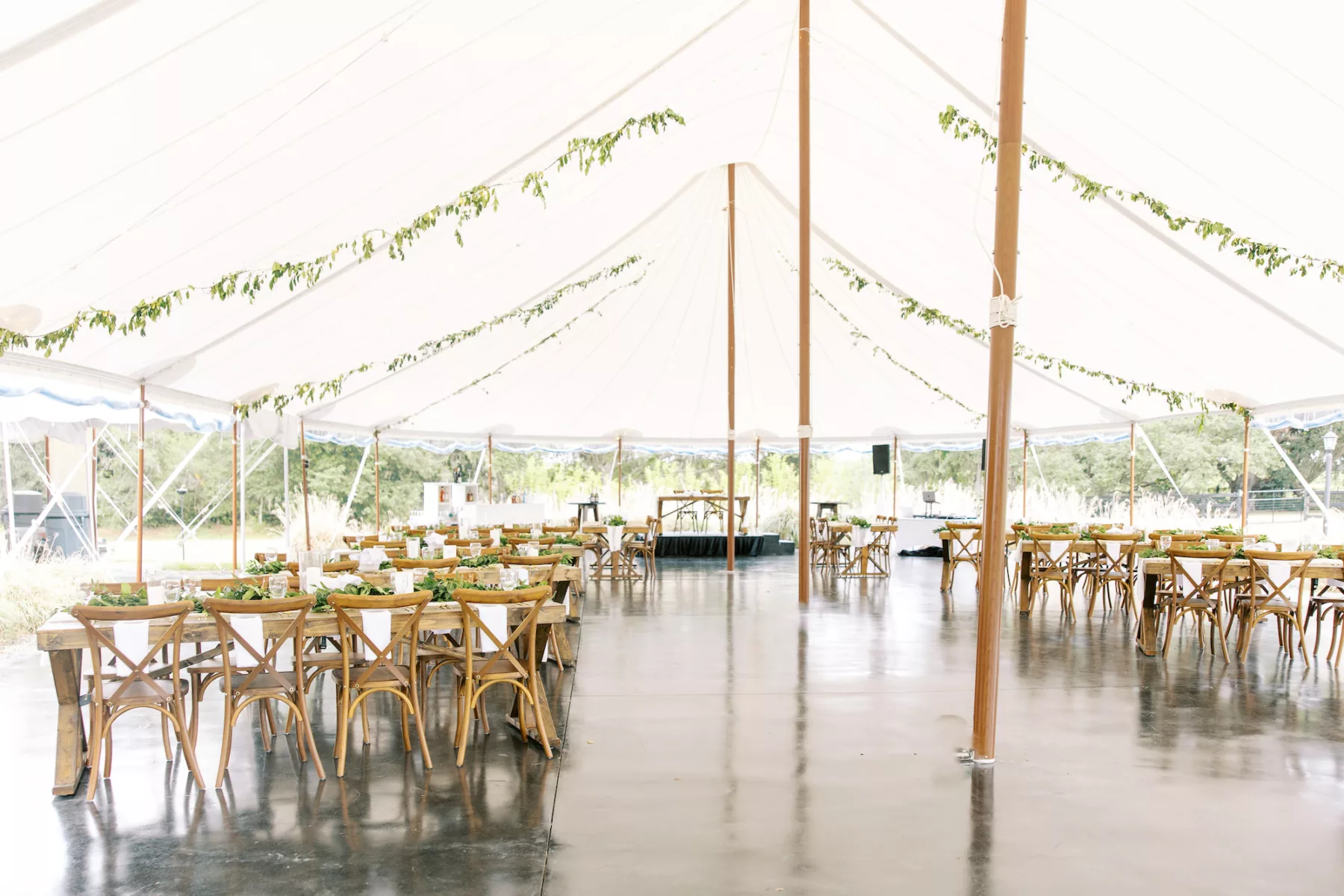 Whimsical Green and White Tented Grand Meadow Wedding Reception Inspiration | Rustic Wooden Tables with Crossback Chairs Ideas | Tampa Bay Event Venue Mill Pond Estate