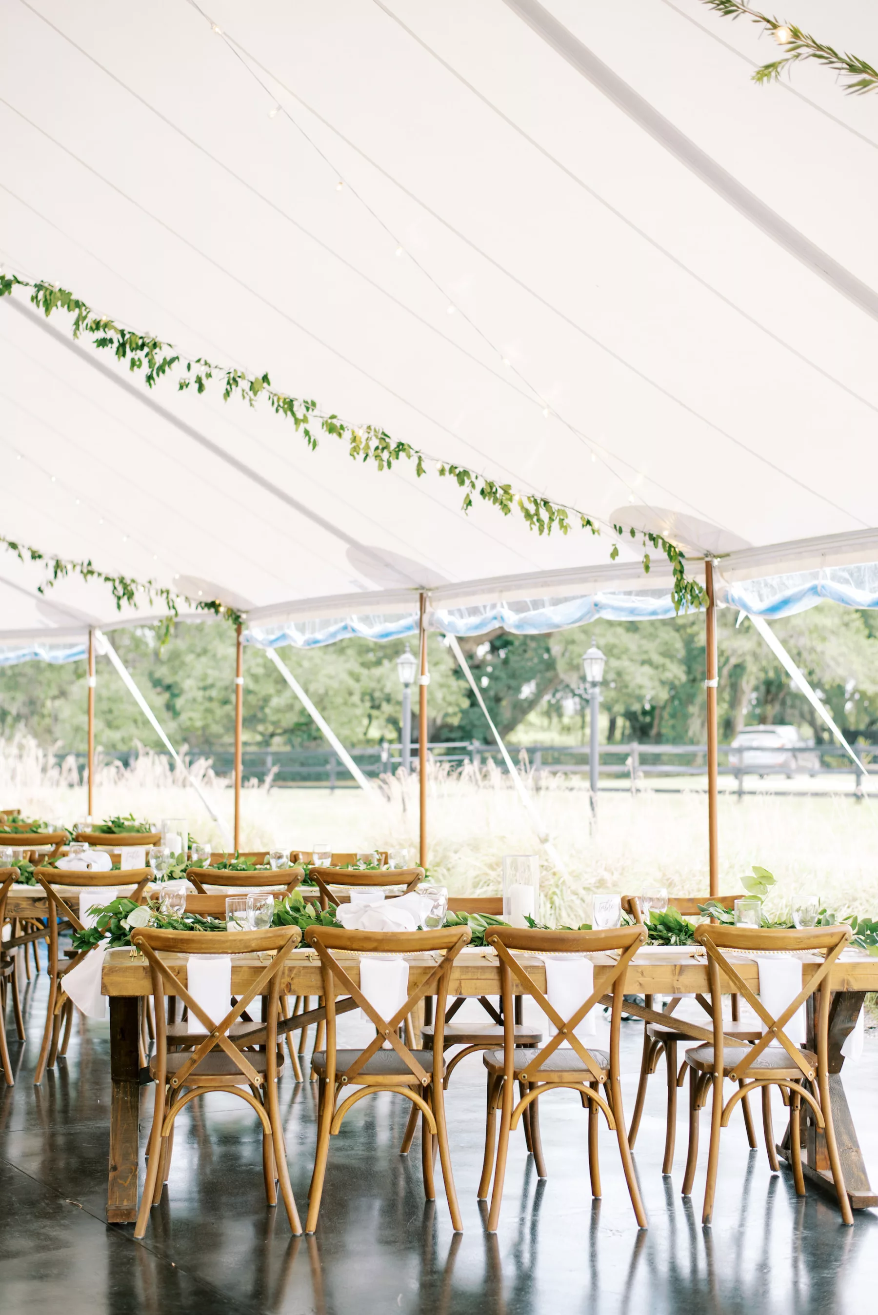 Whimsical Green and White Wedding Reception Inspiration | Rustic Wooden Tables with Crossback Chairs Ideas | Outdoor Tampa Venue Mill Pond Estate