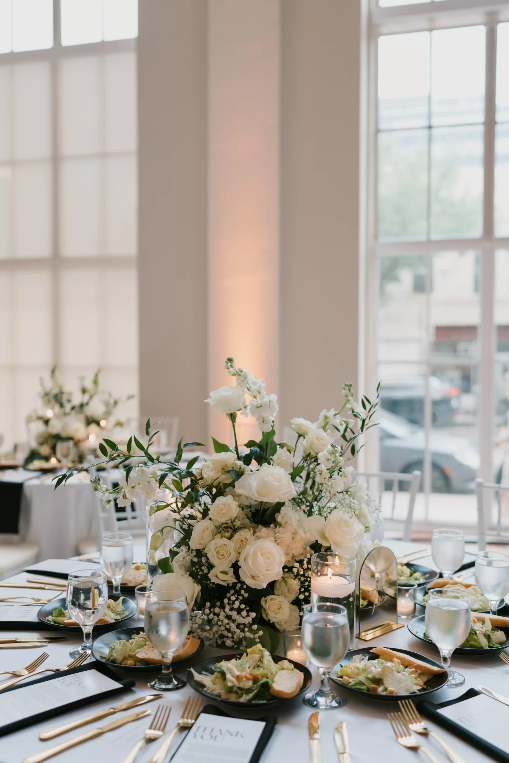 Elegant Spring Wedding Reception Centerpiece Decor Ideas | White Roses, Baby's Breath, and Greenery Flower Arrangement Inspiration