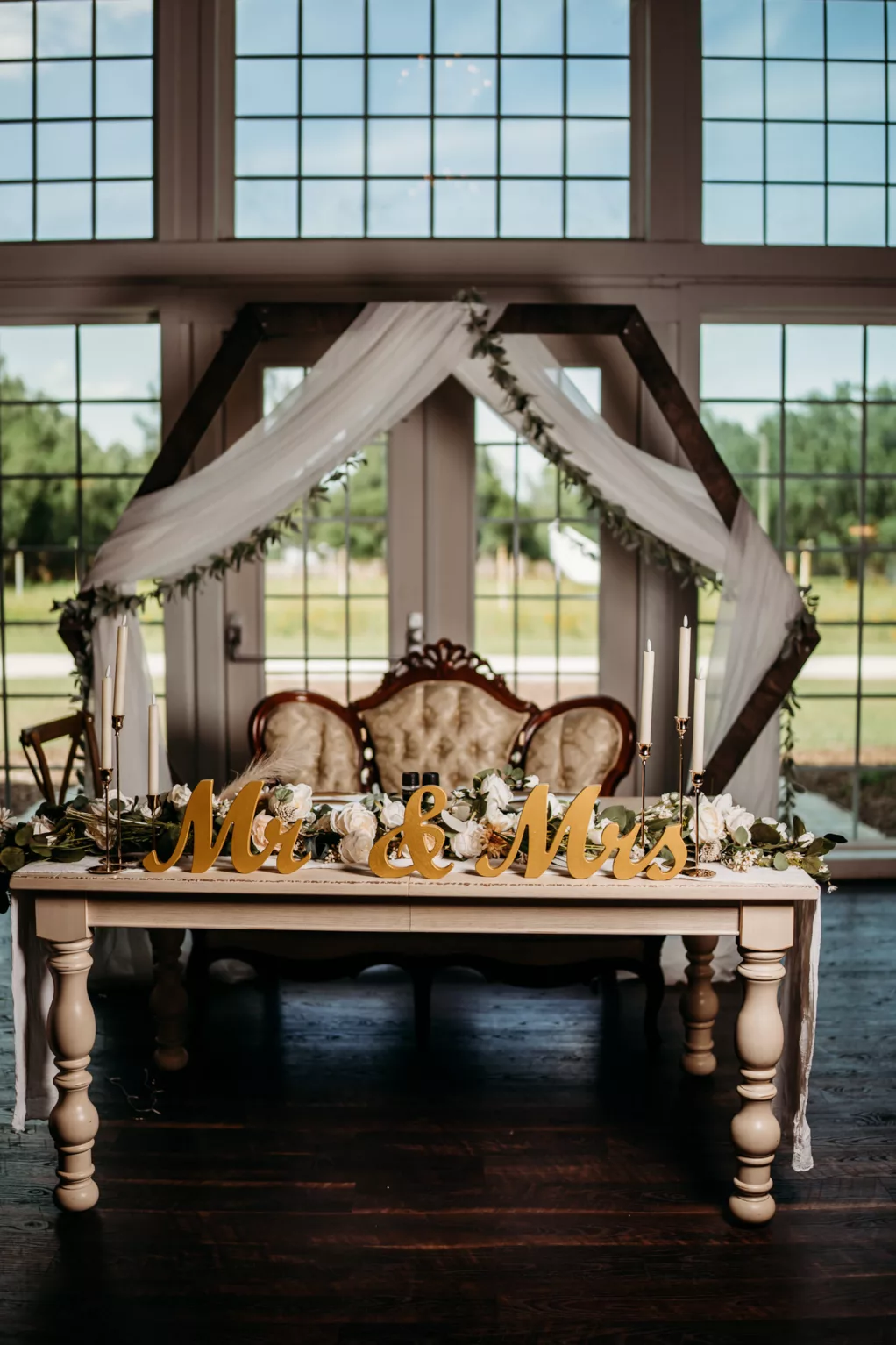 Boho Sweetheart Table Wedding Reception Ideas | Hexagon Backdrop with White Drapery