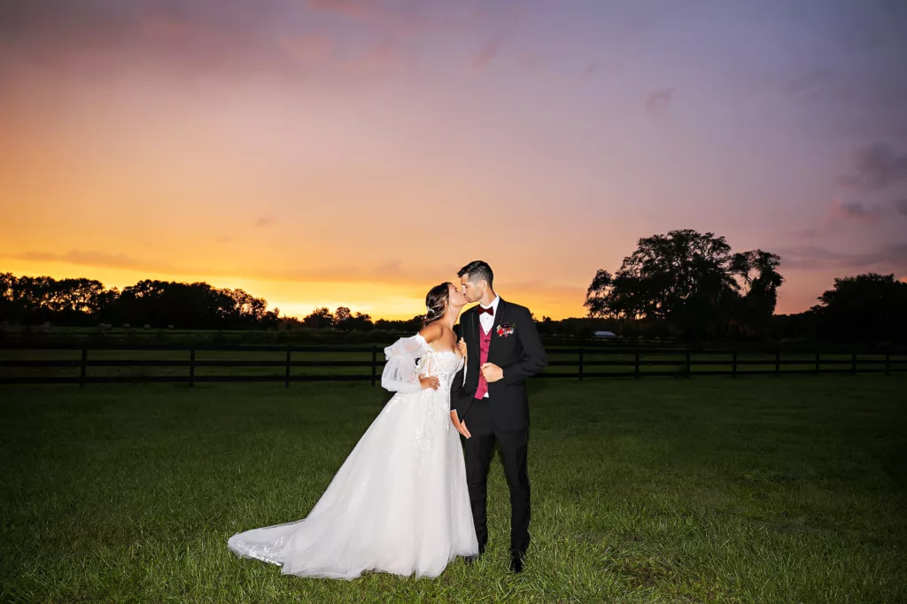 Bride and Groom Sunset Wedding Portrait | Tampa Bay Photographer Limelight Photography | Videographer Priceless Studio Design | Event Venue Legacy Lane Weddings